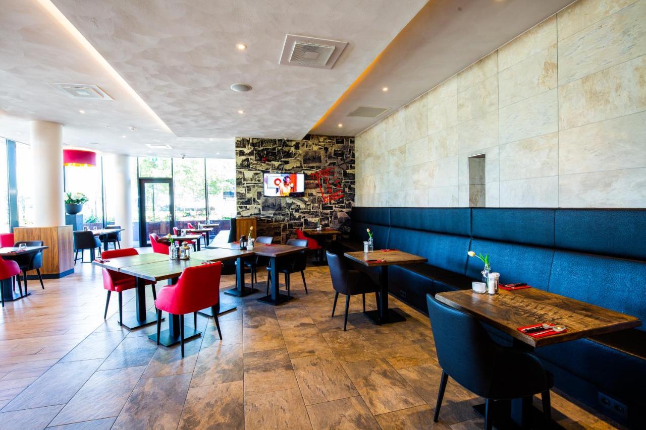 Bastion Hotel Tilburg Bagian luar foto